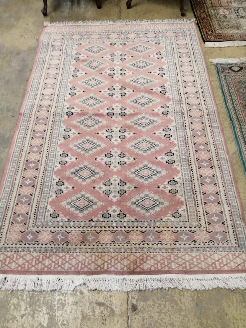 Three North West Persian design runners and rugs, largest 306 x 80cm